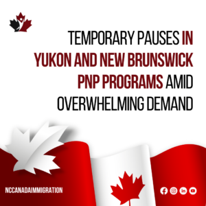 Text reads: "Yukon and New Brunswick temporarily pause PNP programs due to high demand." The image includes the Canadian flag, maple leaves, and social media icons.